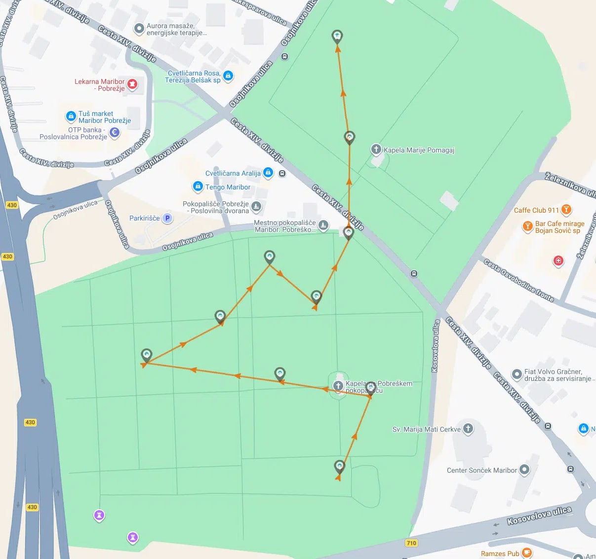 Map of Maribor, Slovenia, displaying a walking route with an orange line connecting multiple pinned stops through a park and city streets.
